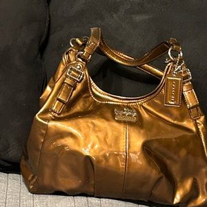 Beautiful bronze colored Coach bag